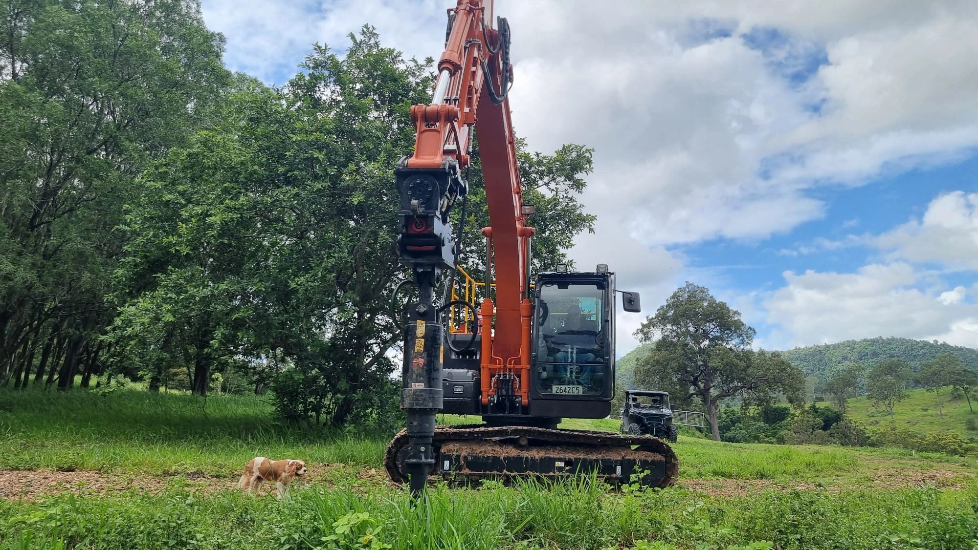 Large excavator at work on a rural property